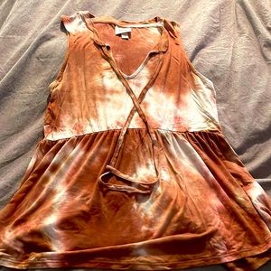 Rust tie dye tank top with string ties at the neck. Flowy and pretty for summer